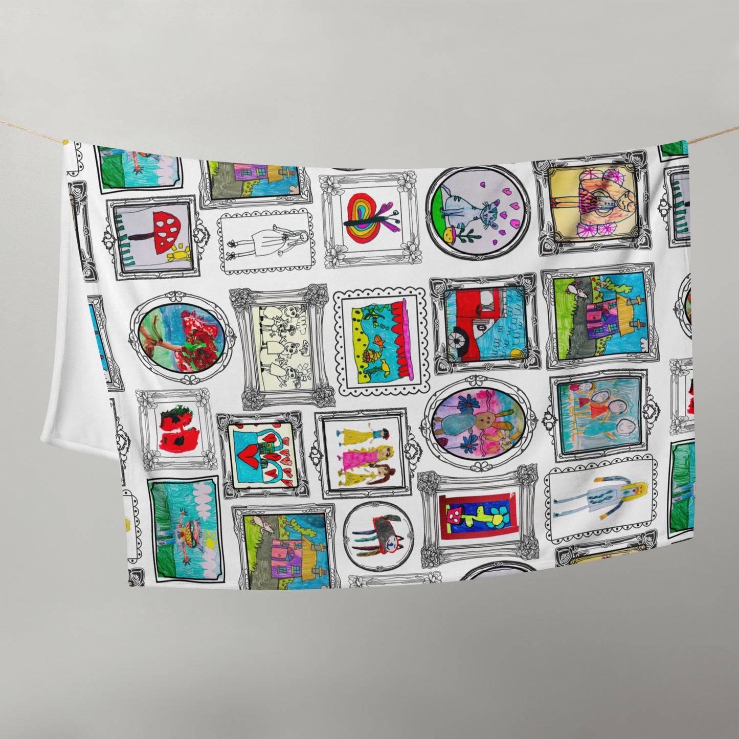 Customised throw blanket highlighting a unique child’s drawing with vivid colours