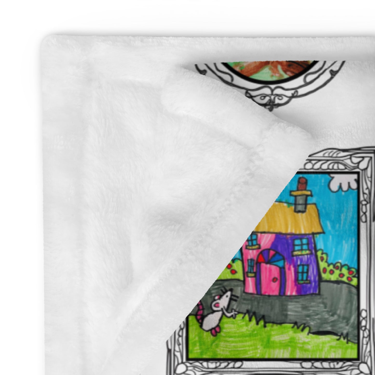 close up of personalised throw blanket with children's artwork