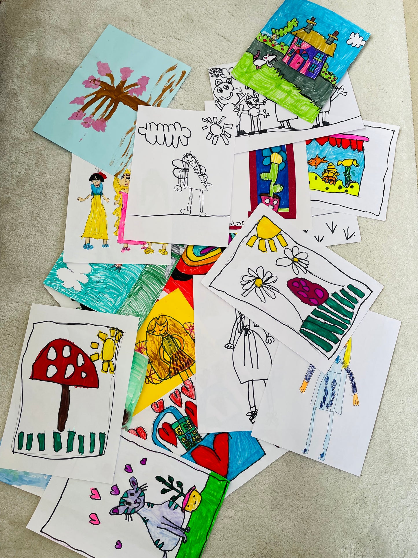 pile of unorganised childrens artwork